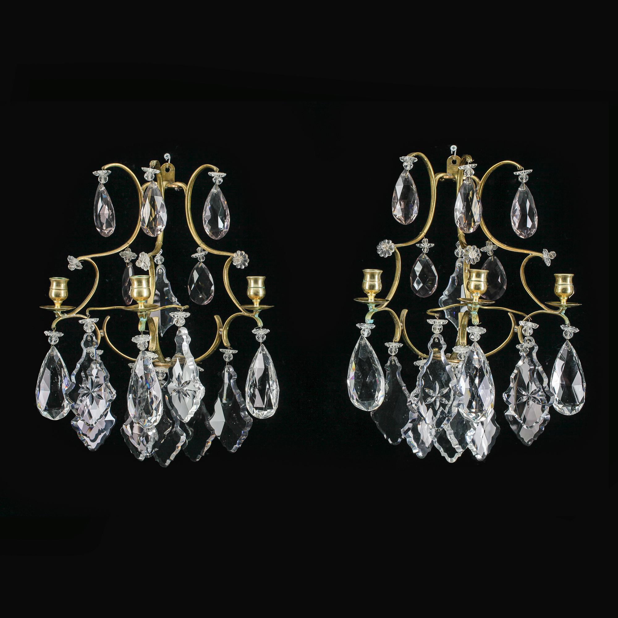 VÄGGLAMPETTER, ett par, rokokostil, omkr år 1900.