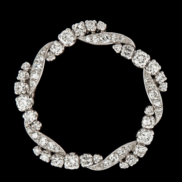 A brilliant- and single-cut diamond brooch, total carat weight circa 1.30 cts.