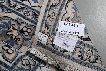 A carpet, Nain, part silk, ca 256 x 199 cm.