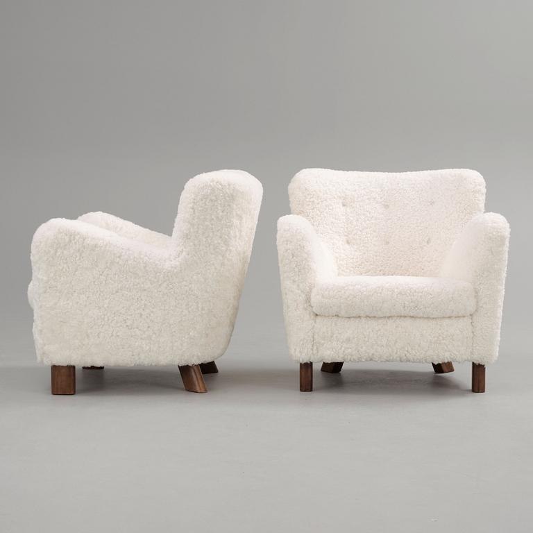 A pair of Fritz Hansen 'Model 1669' armchairs, Denmark.