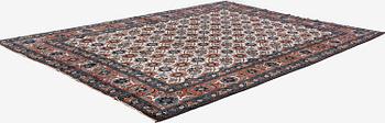 An antique Veramin carpet, West Persia, 380 x 271 cm.