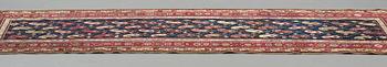 Matto, a runner, an antique Karabagh, ca 268,5-278 x 98,5-103,5 cm.