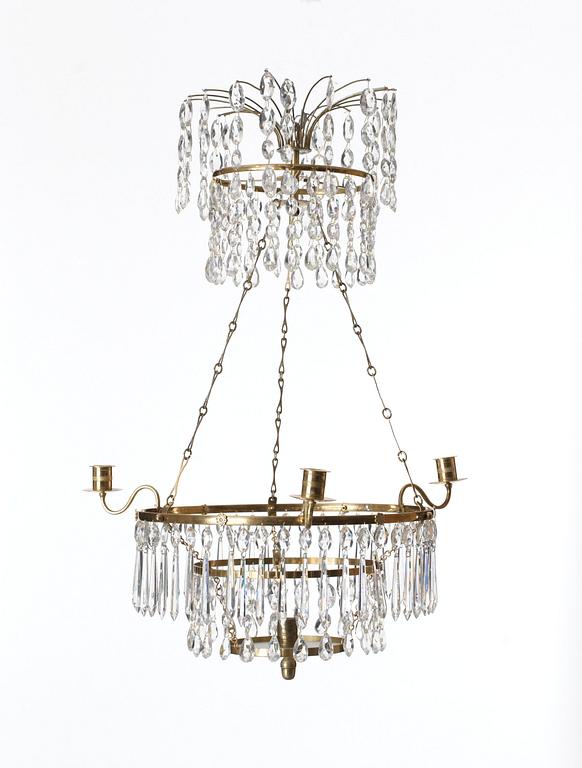 A Gustavian-style four light chandelier.