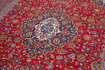 An Oriental carpet, c. 396 x 300 cm.