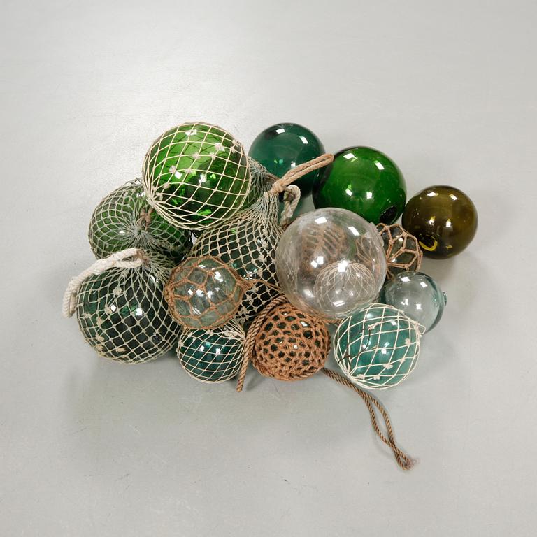 Seventeen glass fishing floats, 20th century.