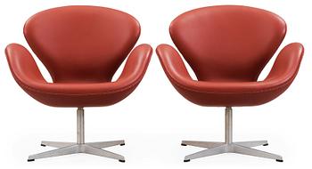 63. An Arne Jacobsen red leather 'Swan' chair, Fritz Hansen, Denmark 2001.