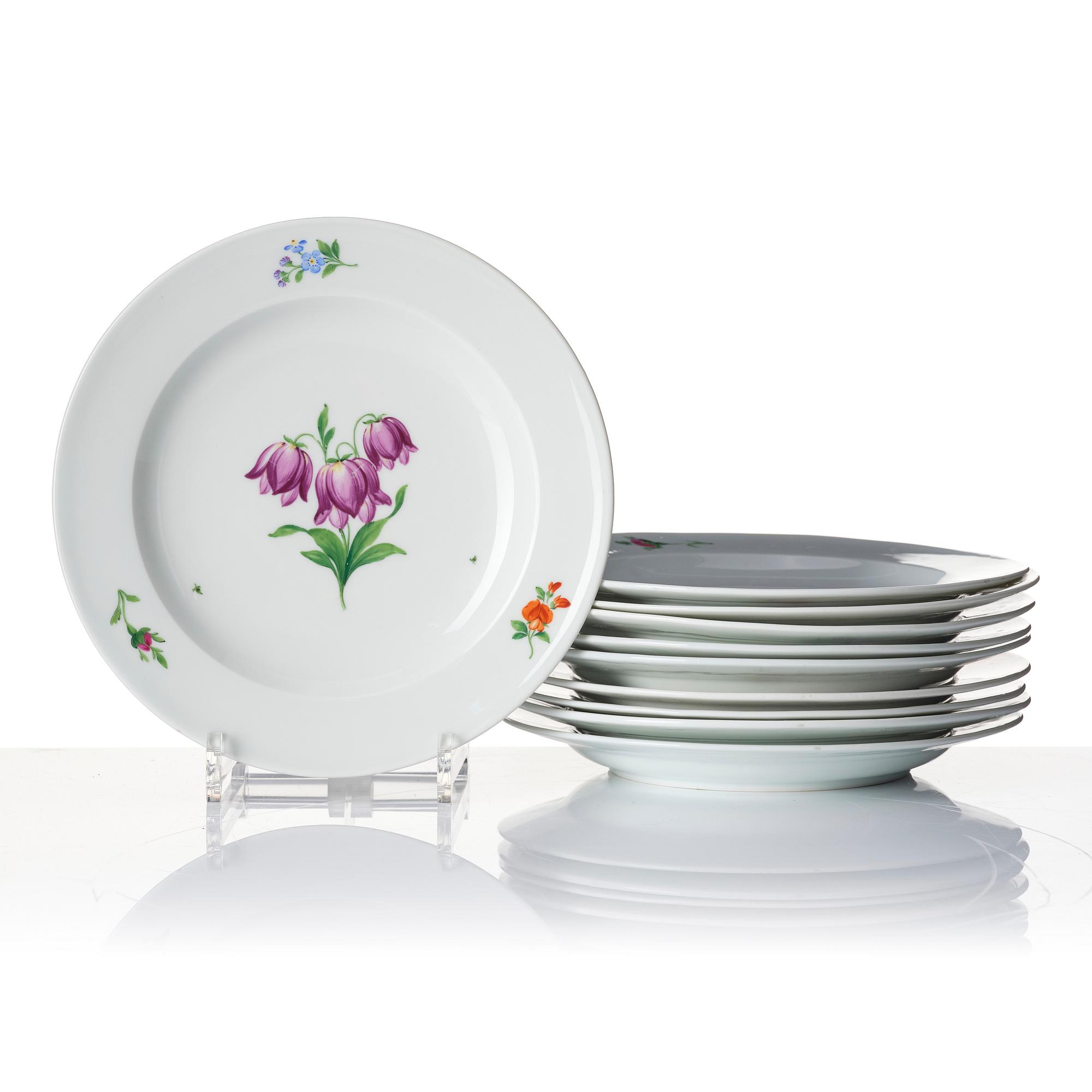 A set of nine porcelain plates, Meissen like mark. first half of 20th century.