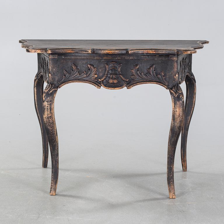 An 18h century rococo table.