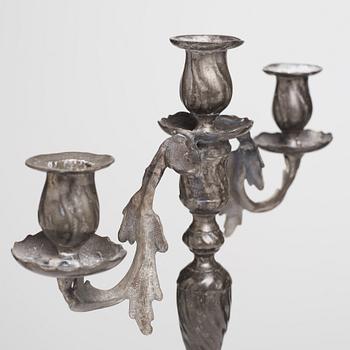 A pair of Swedish Rococo pewter three-light candelabra by Anders Wetterquist, Stockholm 1774.