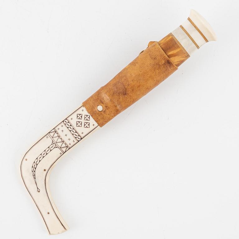 Nils Huuva, a reindeer horn knife, signed and dated -76.