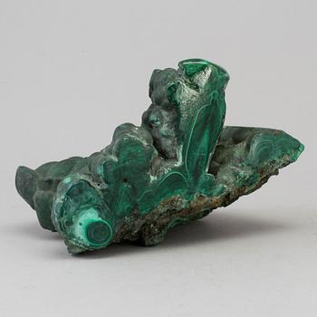 A malachite weight circa 1760 grams.