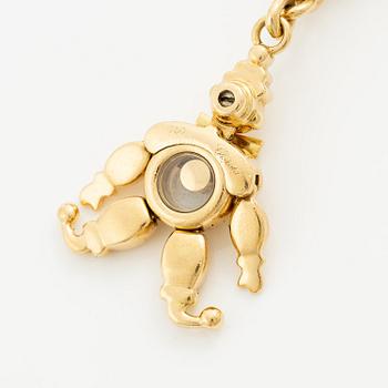 Chopard armband med berlocker 18K guld med runda briljantslipade diamanter.