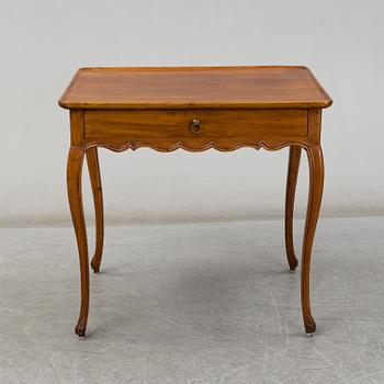 An 18th century Louis XV table.