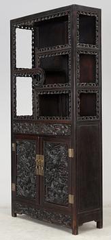 A Chinese hardwood cabinet, early 20th Century.