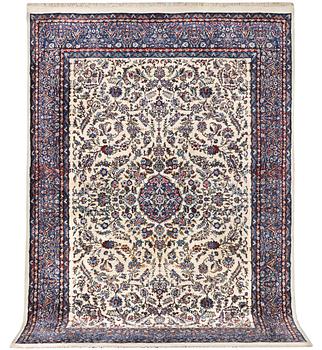 An oriental carpet, c. 308 x 220 cm.