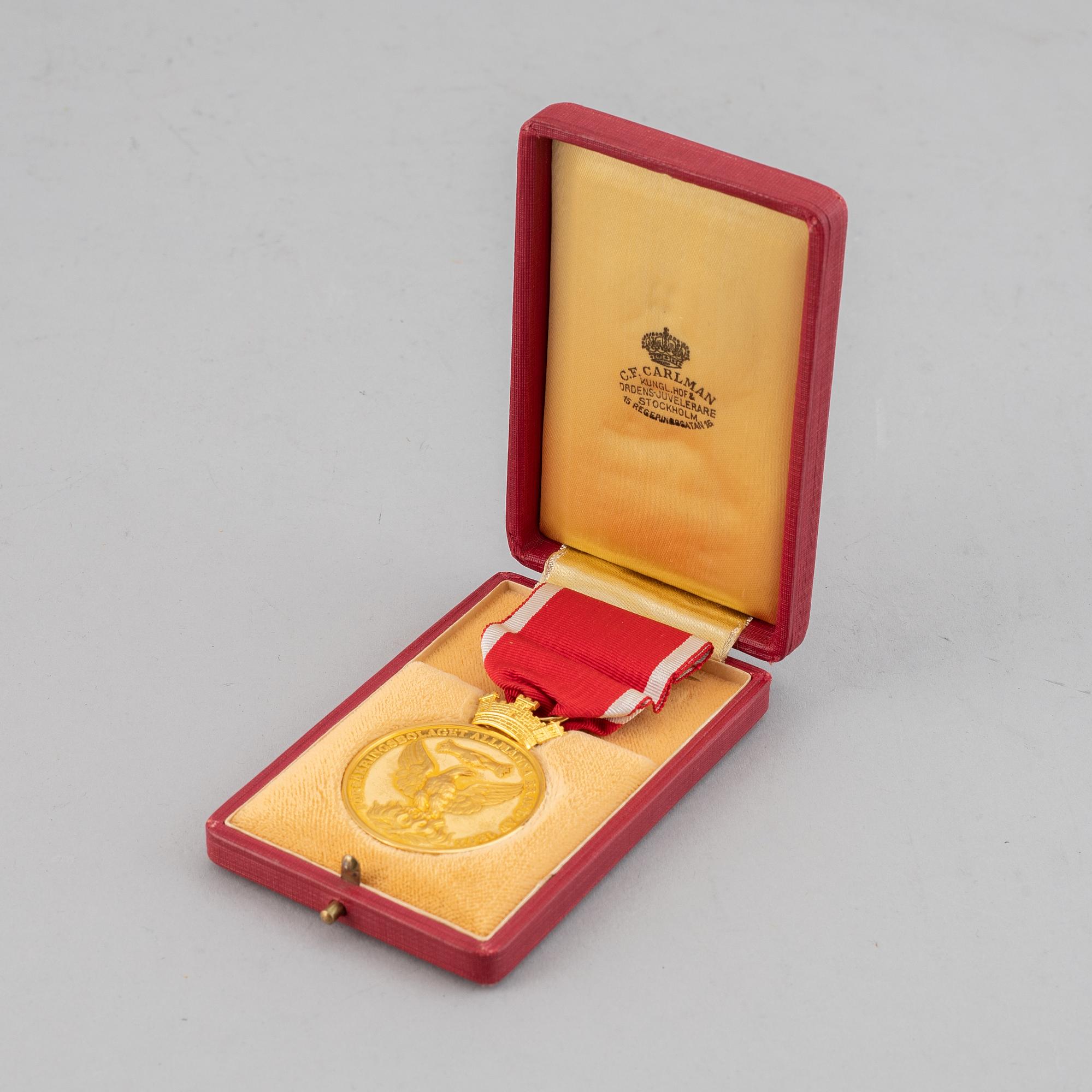 Medalj, Försäkringsbolaget Allmänna Brand af 1842, 18K guld.