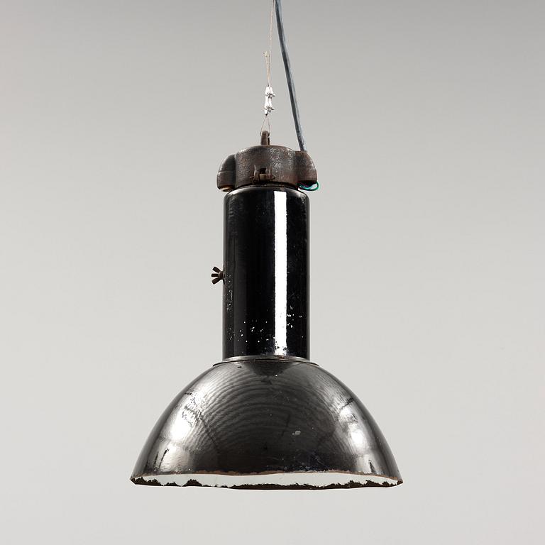 An early 20th century industrial lamp.