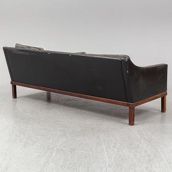 A black leather "The President" sofa by Ingemar Thillmark for OPE-möbler. Sweden.
