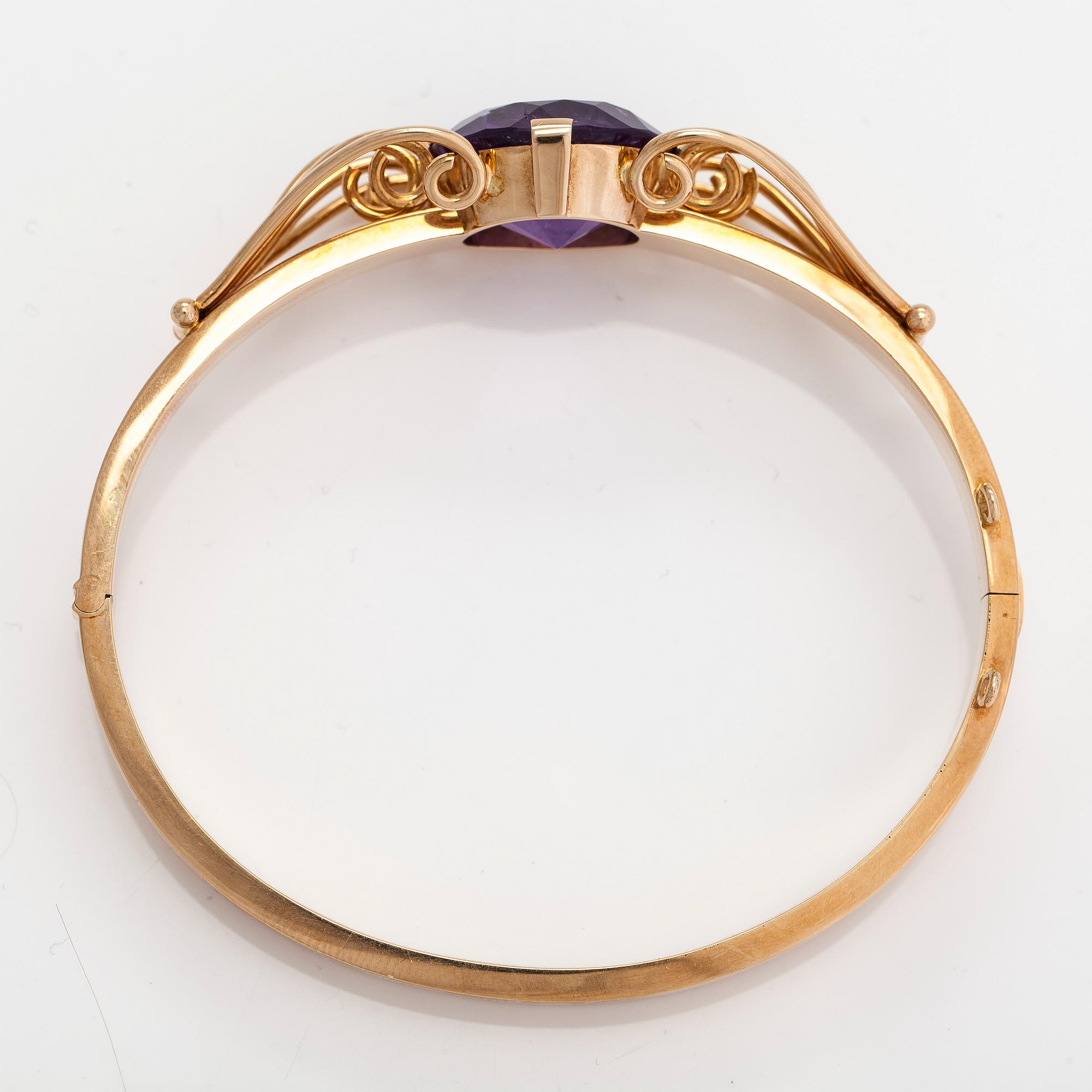 Armband, 14K guld och ametist. Auran Kultaseppä, Åbo 1957.