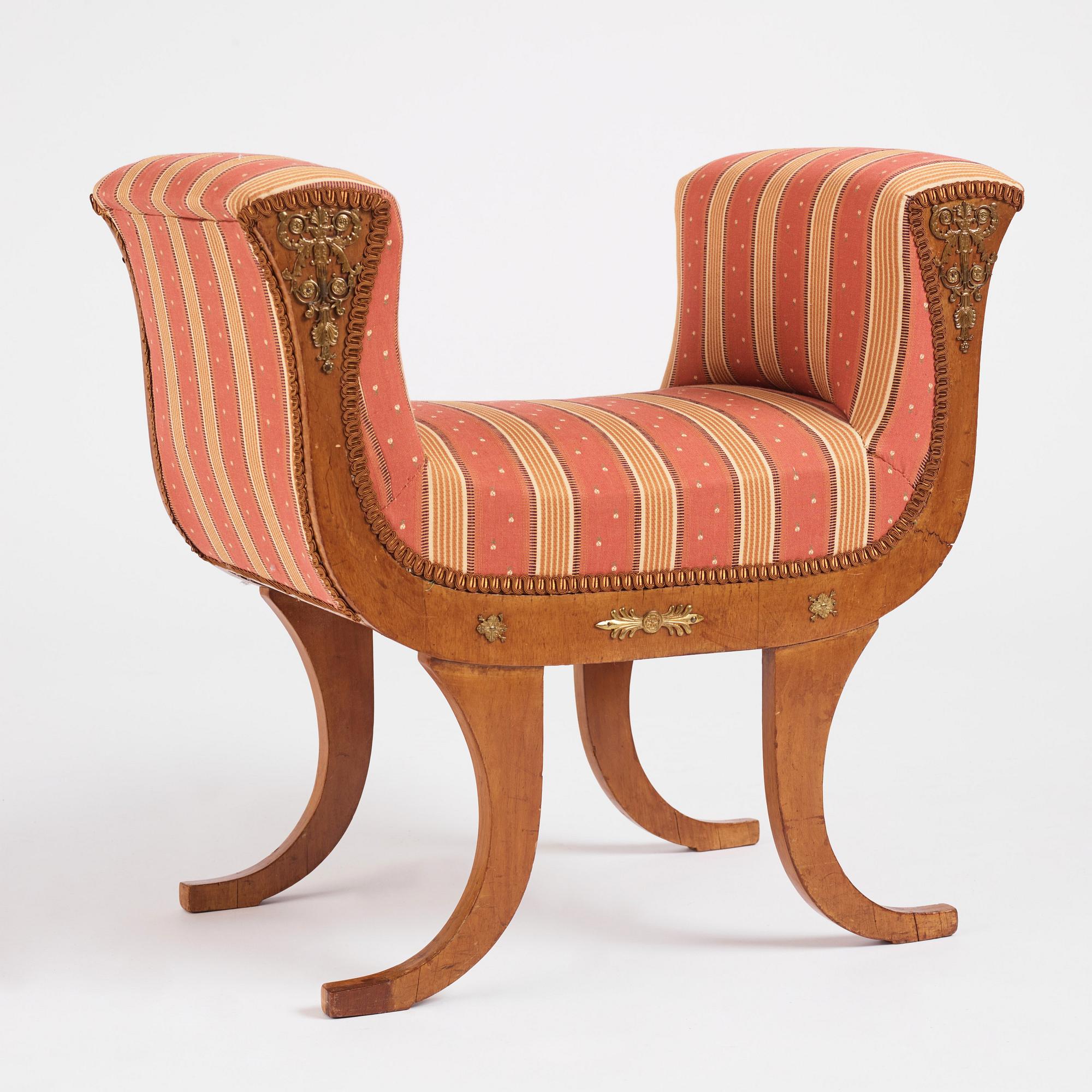 A pair of Swedish Royal Empire stools.