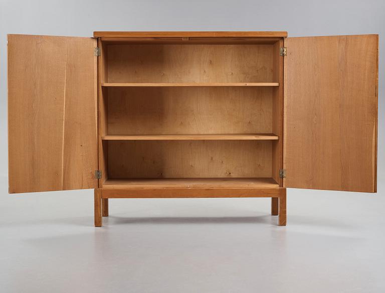 Oscar Nilsson, attributed to, a Swedish Modern oak cabinet, 1940's.