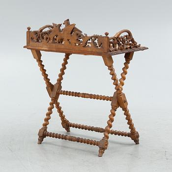 A Baroque-style serving table, circa 1900.