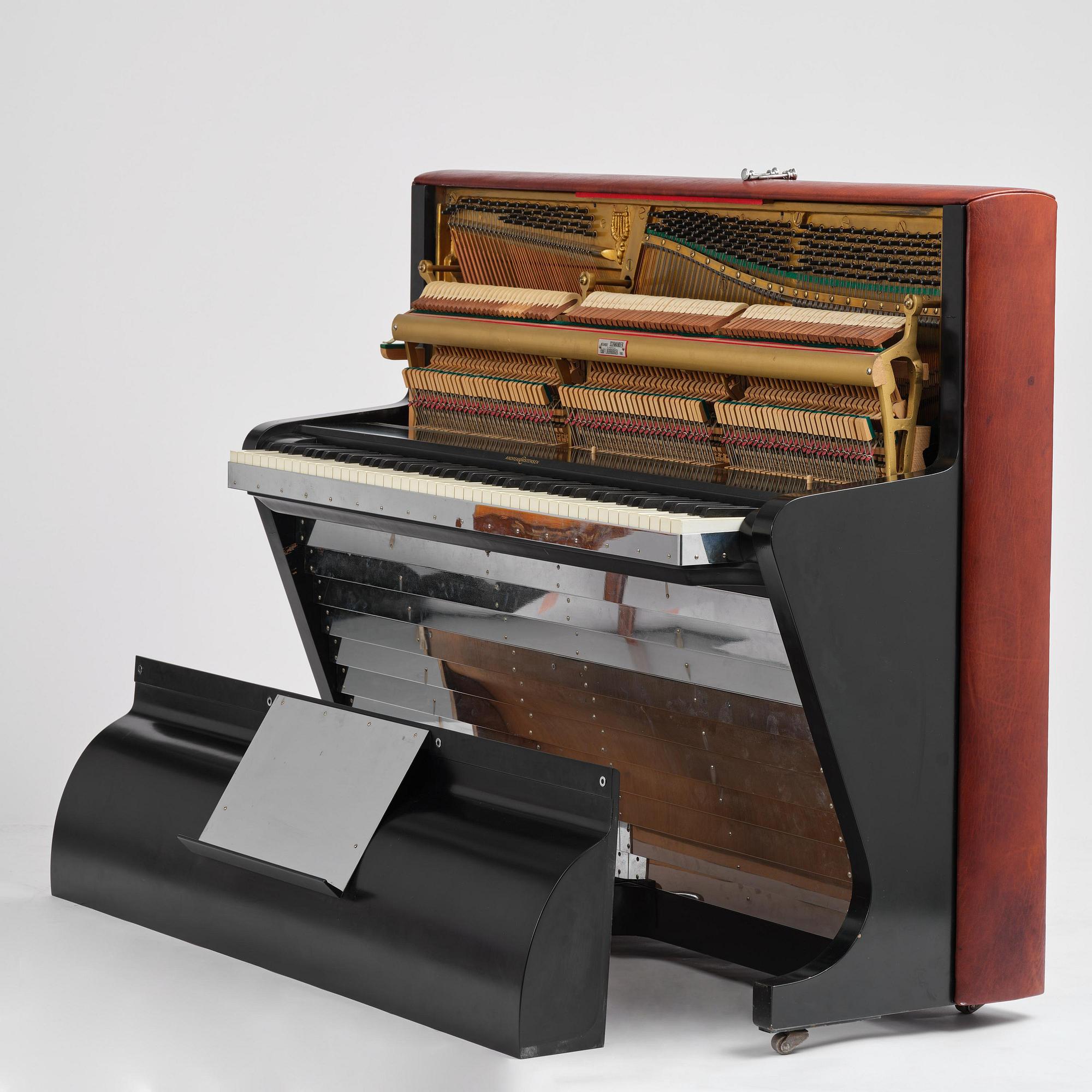Poul Henningsen, a "PH Upright Piano", executed by Andreas Christensen, Denmark, 1940s.