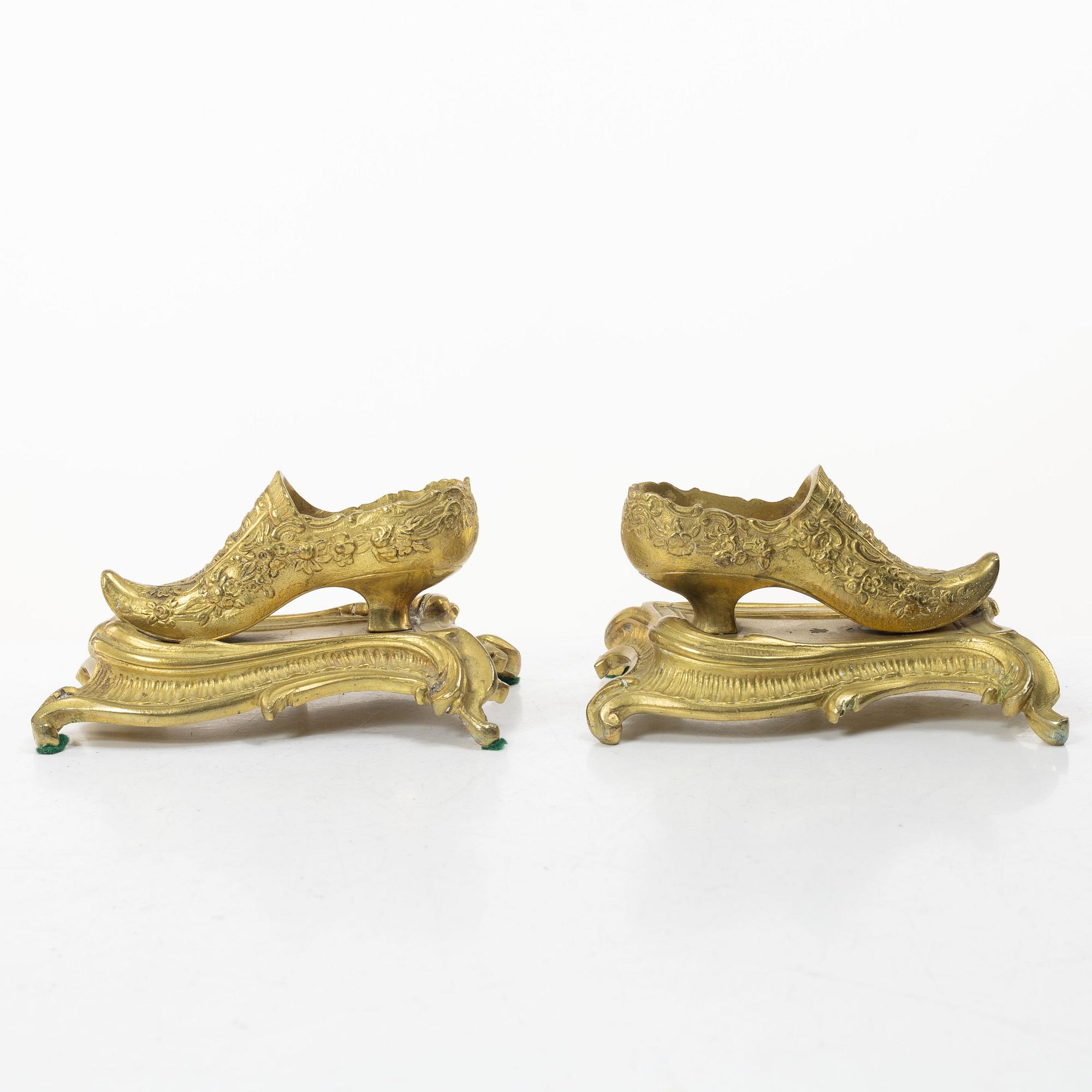 Table ornaments in the form of shoes, a pair, fire-gilt bronze, probably France, 19th century.