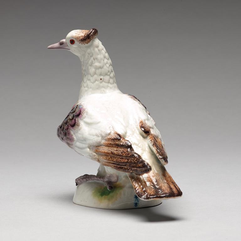 A porcelain figure of a dove, possibly Samson.