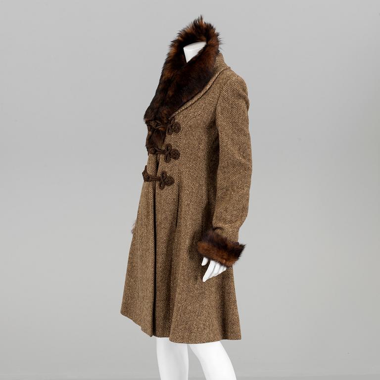 A coat by Ralph Lauren , in size 8.