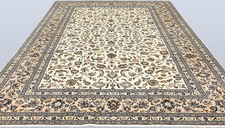 A Keshan carpet, c. 365 x 250 cm.