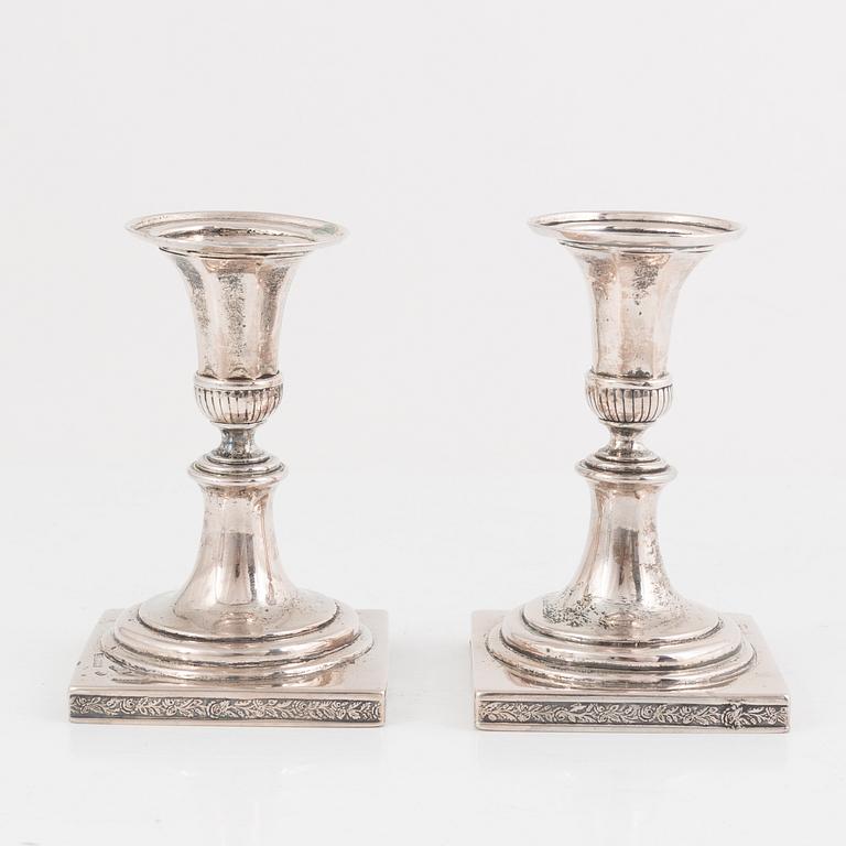 A Pair of Empire Silver Candlesticks, indistinct hallmarks, first half of the 19th Century.