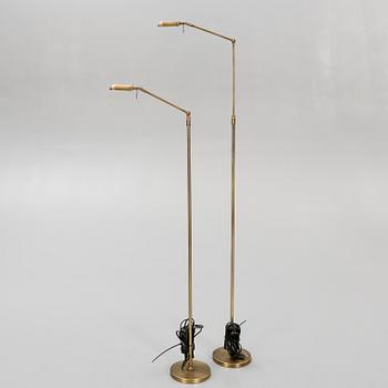 A pair of brass floor lamps 21 st century.