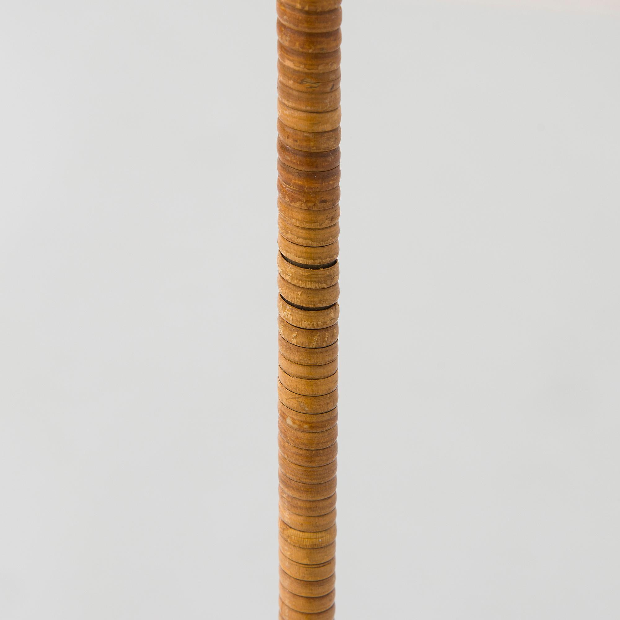 Paavo Tynell, a mid-20th century K10-10 floor lamp for Taito.