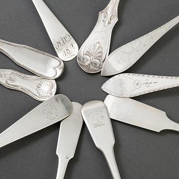 A set of 10 different spoons of different nationalities.