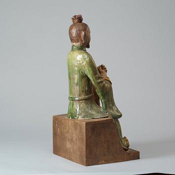 A green and yellow glazed figure, Ming dynasty 17th century.