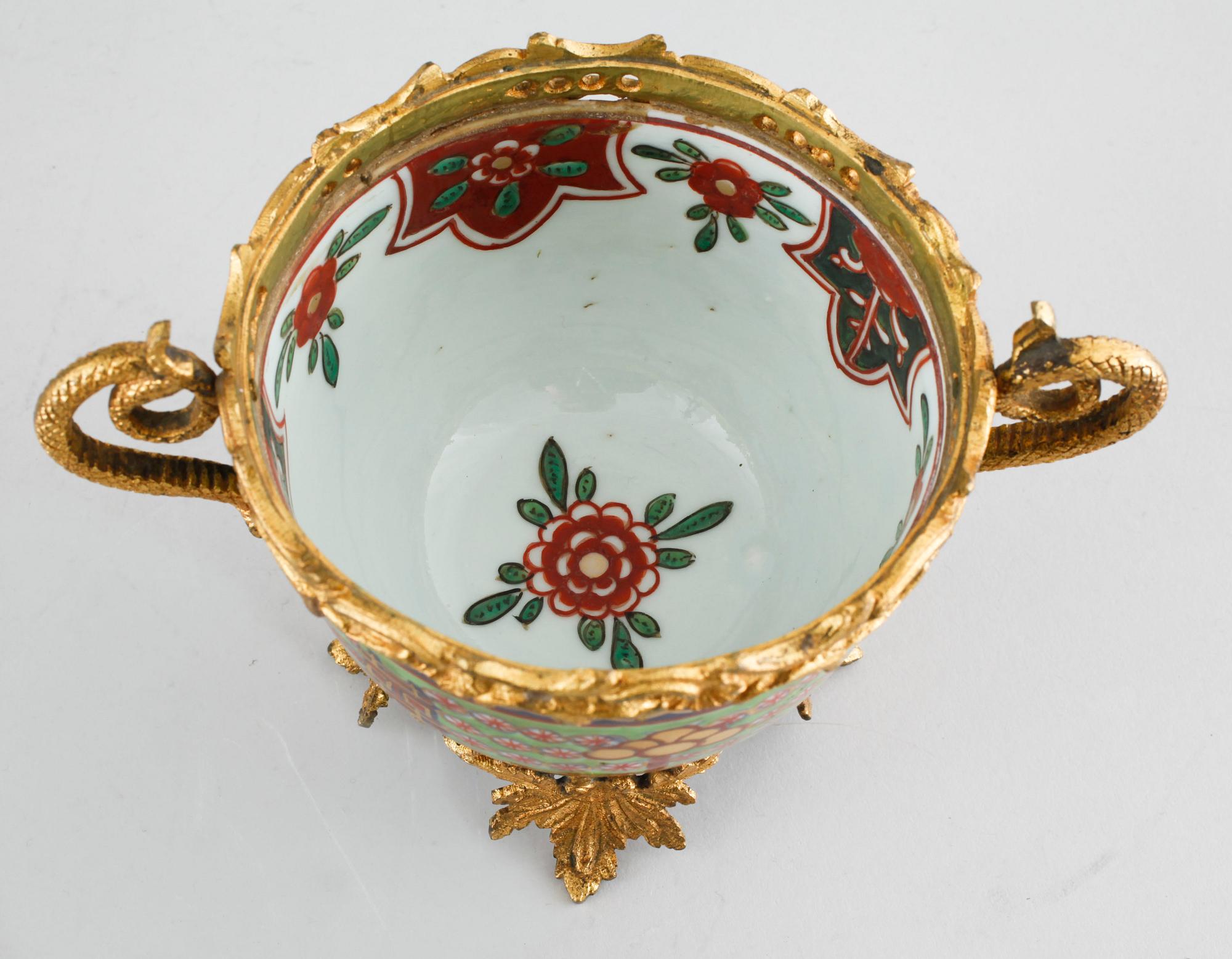 Three polychrome cups with barrels, three cups, one bowl with lid and one plate, Qing dynasty, 18/19th century.
