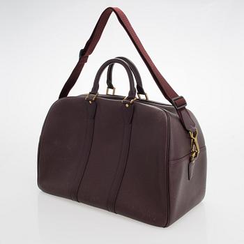 Louis Vuitton, 'Taiga Kendall PM' Bag.