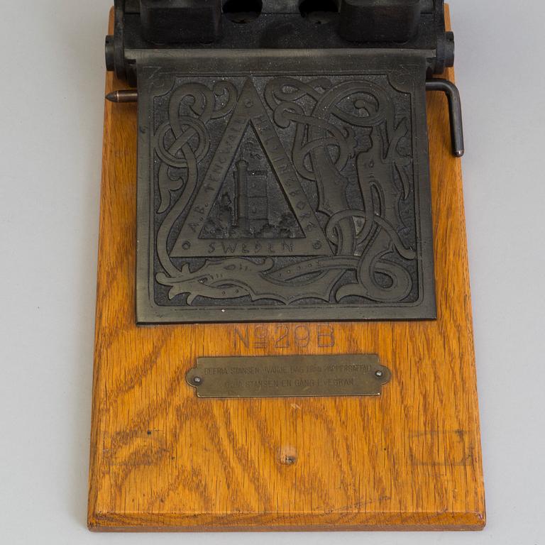 A early 20th century perforator.