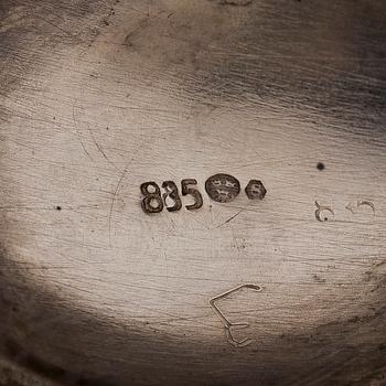 A three-piece silver coffee service, Swedish import marks. Silver sugar tongs, T.K. Alenius Vasa 1953.