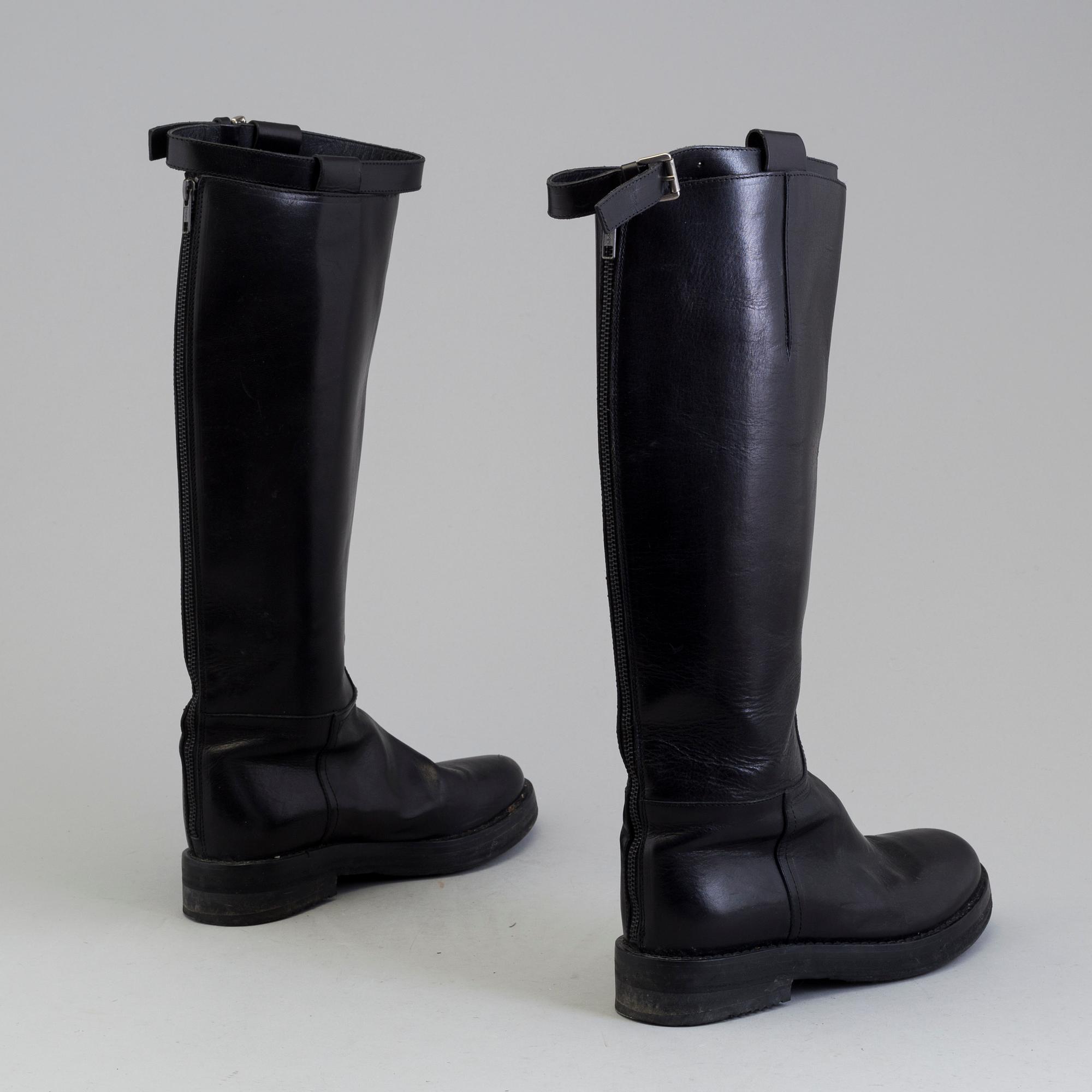 a pair of Ann Demeulemeester, "Vitello Lucido Nero Riding Boots". Size 38.