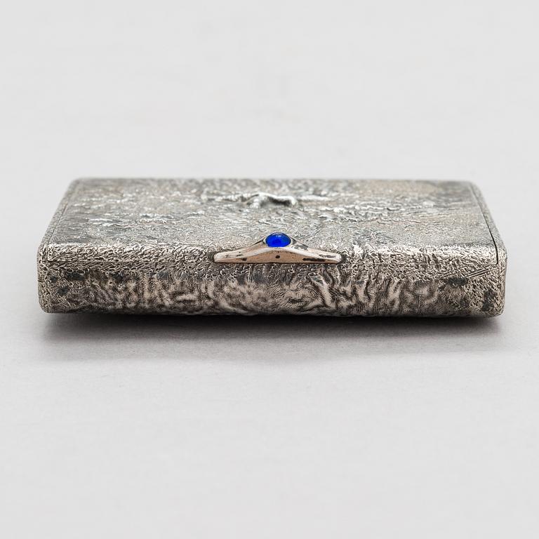 A Russian, early 20th century silver cigarette case, samorodok technique.