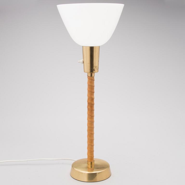 A 1960s '940 025' table lamp for Stockmann Orno, Finland.