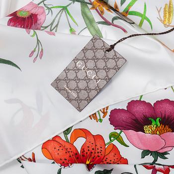 Gucci, a 'Flora' twill silk scarf.