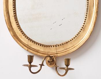 A pair of Gustavian two-light giltwood girandoles by J. Åkerblad (master 1756-1799).