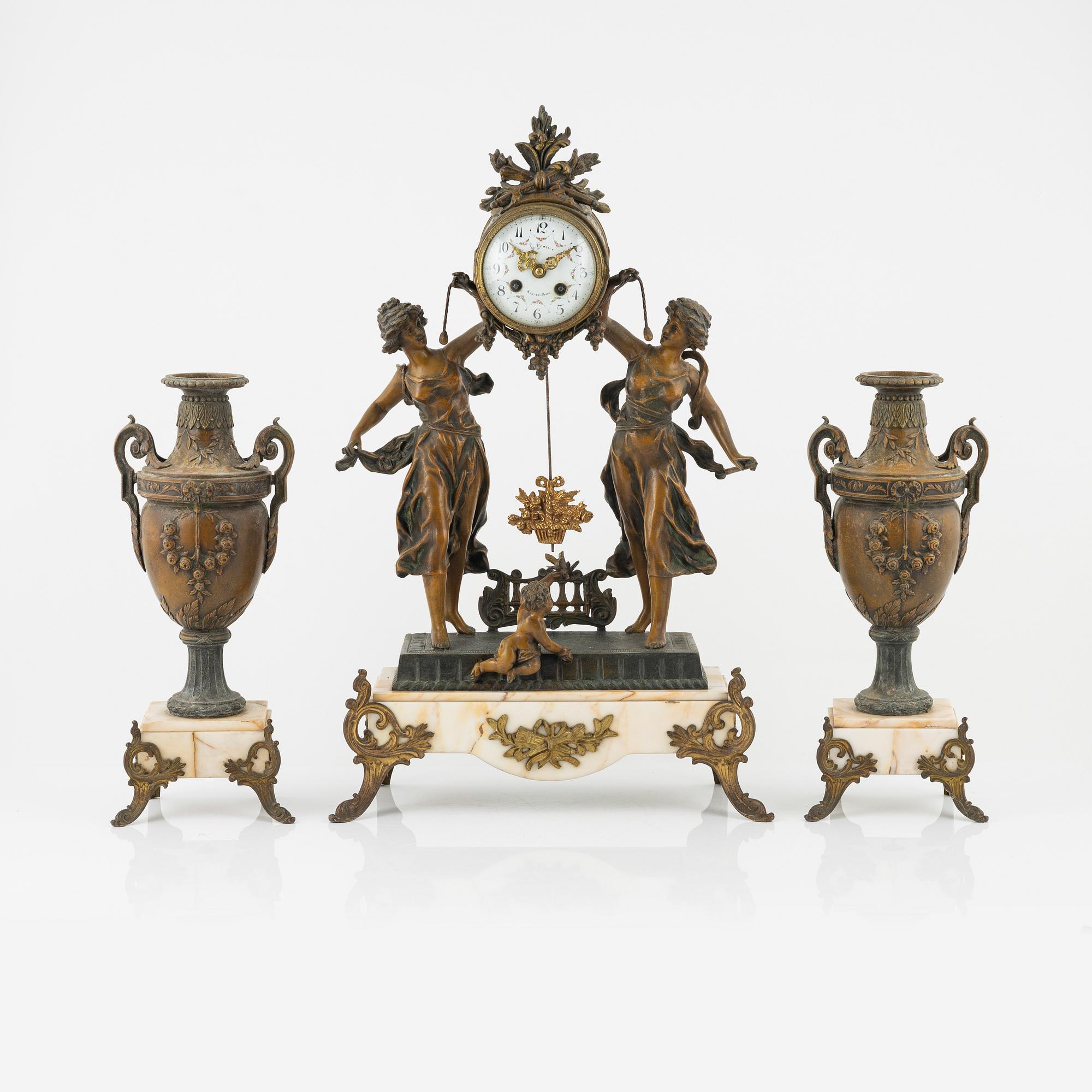 A three-piece mantle set, L. Ferciot, Aix-en-Othe, France, late 19th Century.
