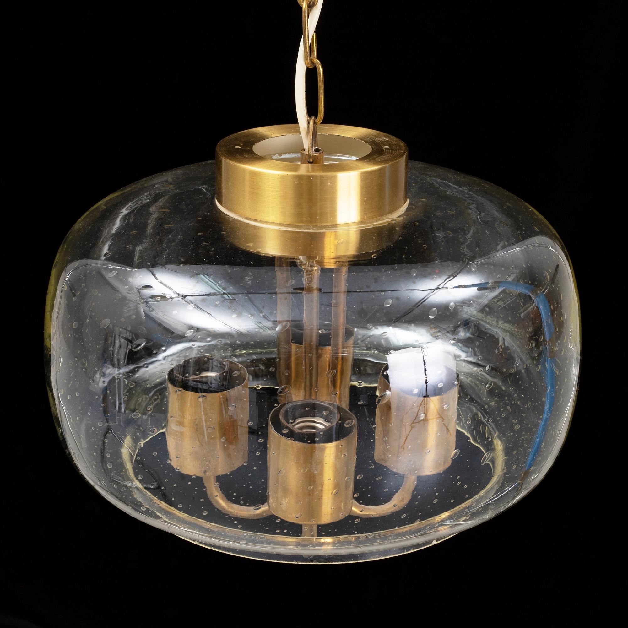 A 1960/70s glass and brass ceiling lamp.