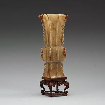 A Chinese archaistic nephrite beaker vase (Gu).