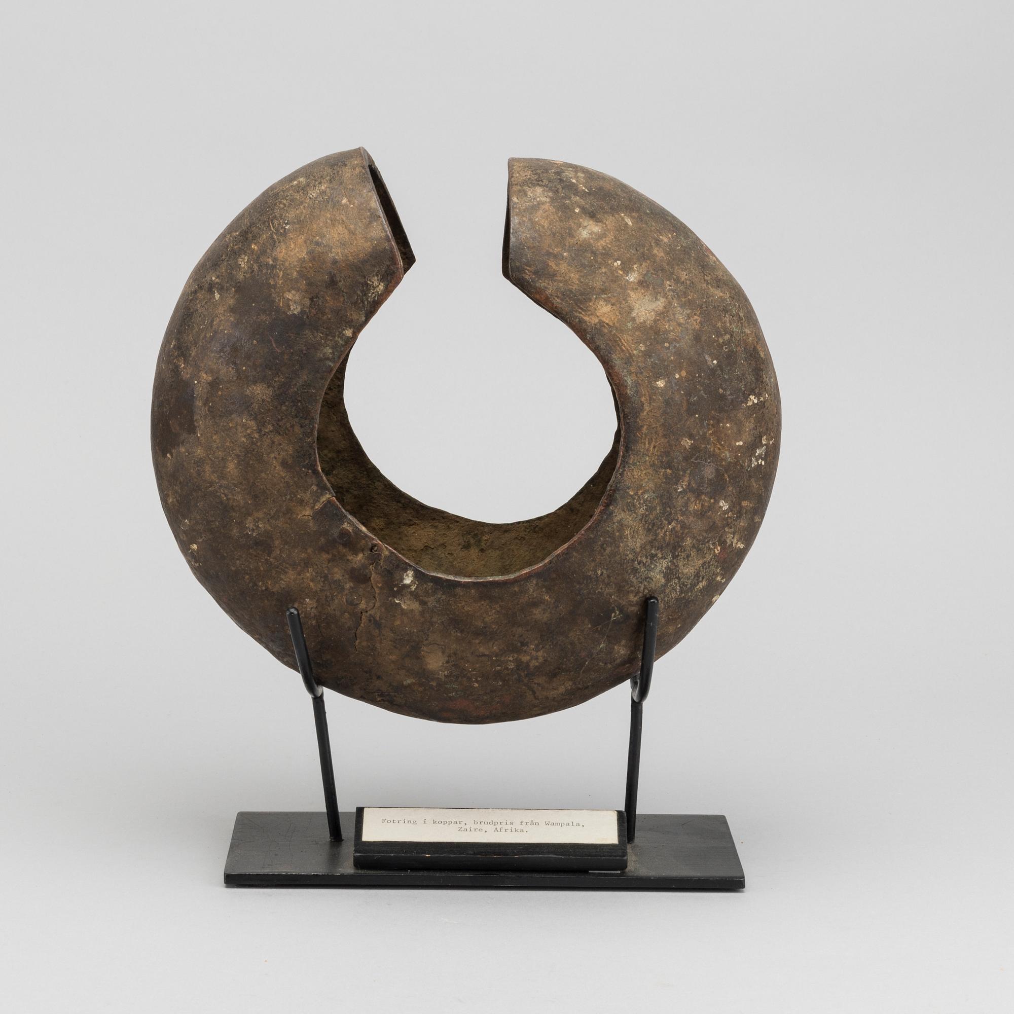 A COPPER FOOTRING FROM WAMPALA ZAIRE.