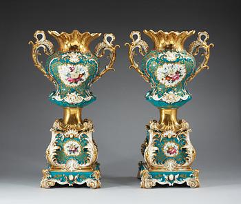 A pair of large french vases on stands, Jacob Petit, mid 19th Century.